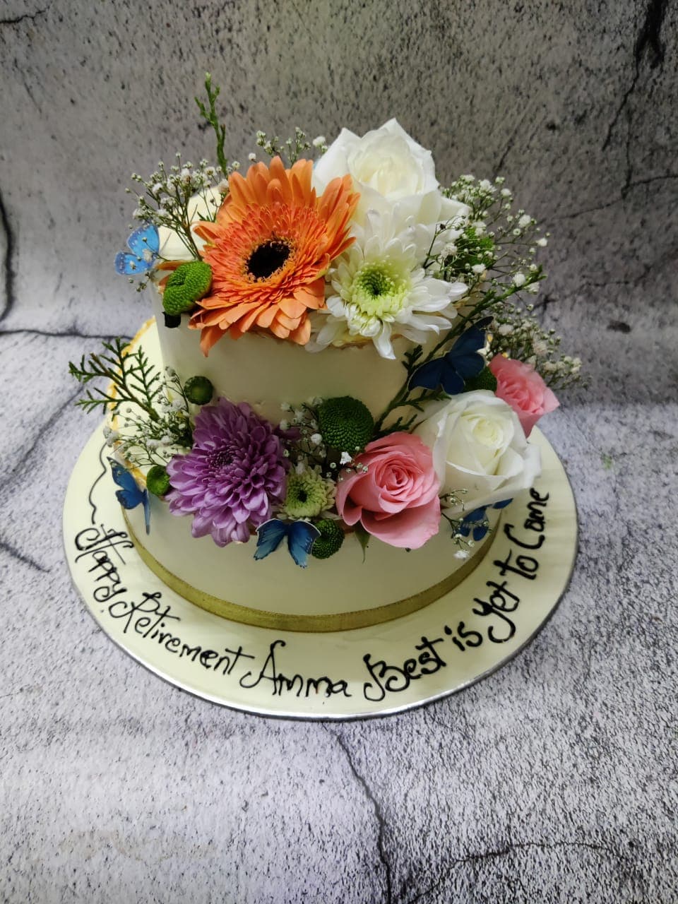 Two-tier floral retirement cake