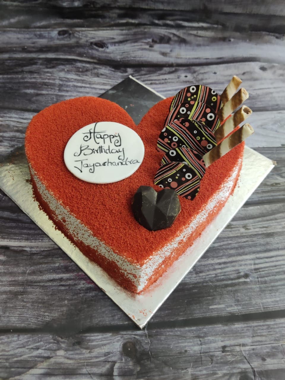 Heart-shaped red velvet birthday cake